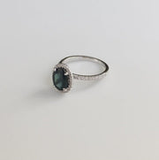 VIDEO Teal sapphire with diamond halo and diamond micro pave set in white gold. DANA WALDEN BRIDAL. 