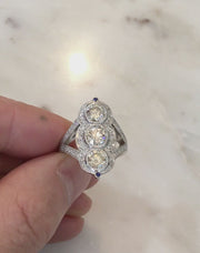 Video of the Charlotte diamond cocktail ring with blue sapphire accents.