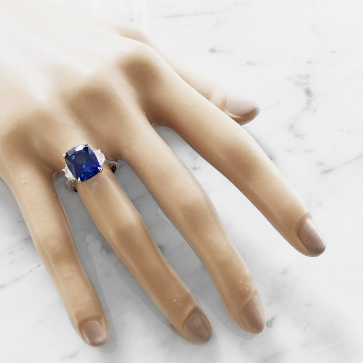 Cushion cut sapphire engagement ring with half moon diamonds on hand in platinum - Alexandra