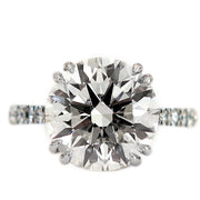 5 carat round diamond engagement ring with micro-pave diamond band and secret diamonds in platinum