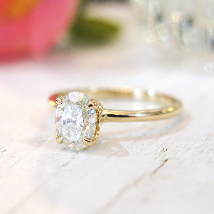 Lab-created diamond oval solitaire engagement ring by Dana Walden Bridal.