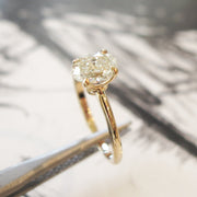 Lab-created diamond oval solitaire engagement ring by Dana Walden Bridal.
