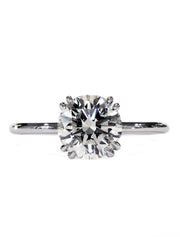 Delicate diamond solitaire in platinum with double claws custom designed in nyc - Bailey