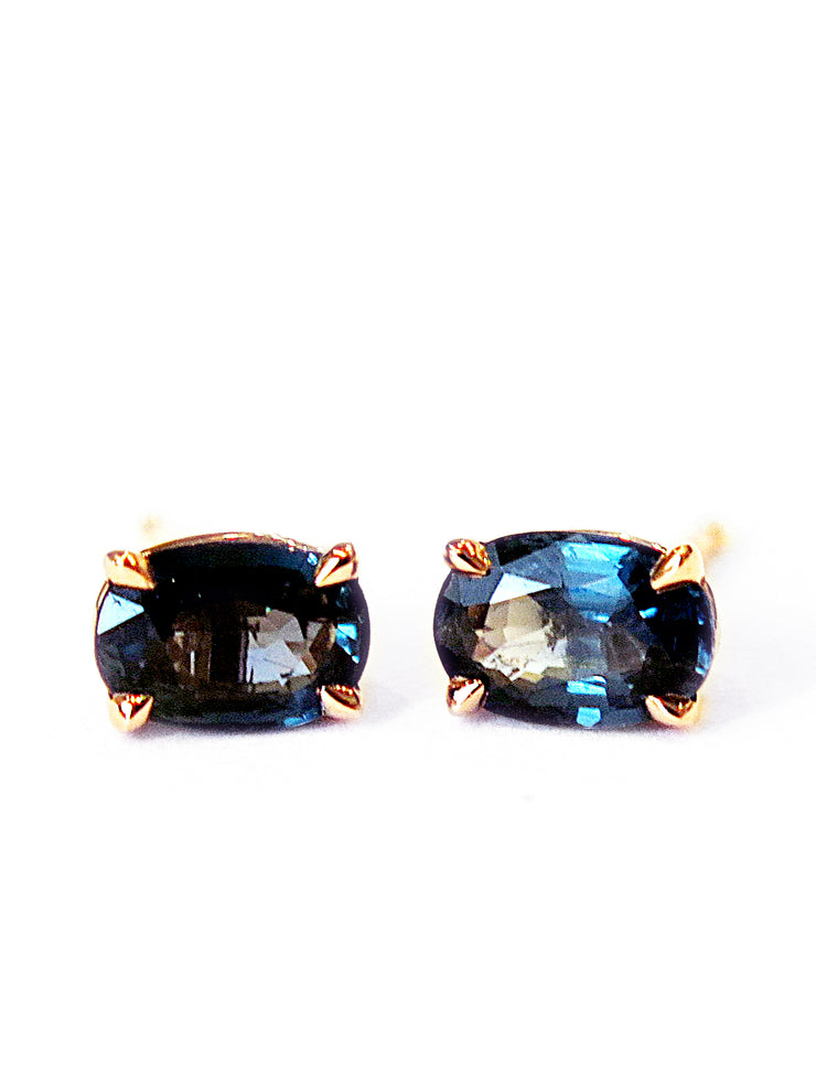 Oval stud earrings with juicy and rich teal sapphires in a rose gold setting. Designed and handmade by Dana Walden NYC.