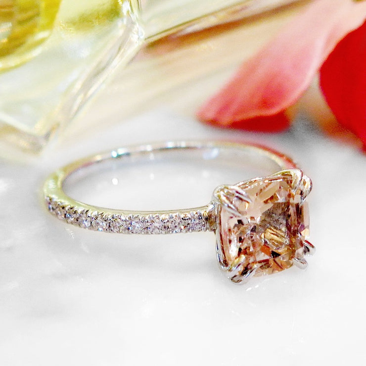 Padparadscha  sapphire engagement ring with white diamond accents. DANA WALDEN BRIDAL NYC.