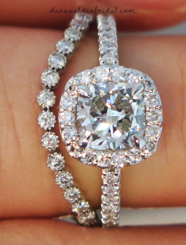 Diamond halo engagement ring with curved diamond band. Made in New York City.