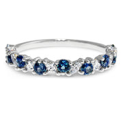 Half wedding band with diamond marquise cut gems alternating with round teal sapphires. Handmade by DANA WALDEN NYC.
