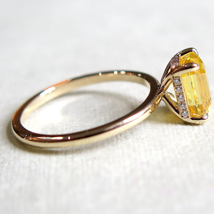 Unique yellow sapphire engagement ring in gold with secret diamonds 
