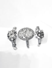 A trio of classic diamond engagement rings in platinum by Dana Walden Bridal