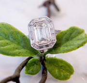Custom Emerald Cut Diamond Engagement Ring in Halo Setting with Baguette & Round Diamonds in Platinum