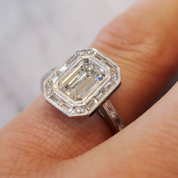 Custom Emerald Cut Diamond Halo with Baguette and Rounds on Hand 