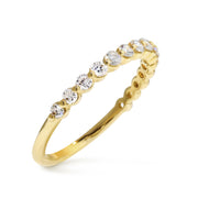 Bezel set diamond wedding band or engagement band. Handmade by Dana Walden and set in 14k yellow gold.