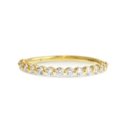 Bezel set diamond wedding band or engagement band. Handmade by Dana Walden and set in 14k yellow gold.