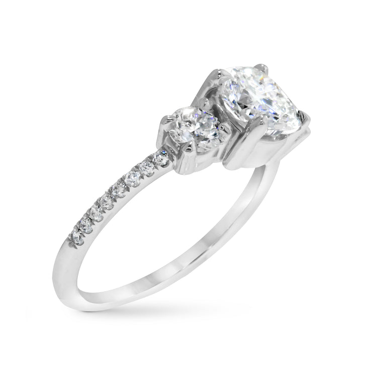 Lab Diamond three stone engagement ring with round lab-grown diamond accents and a pave band. Made in New York City.