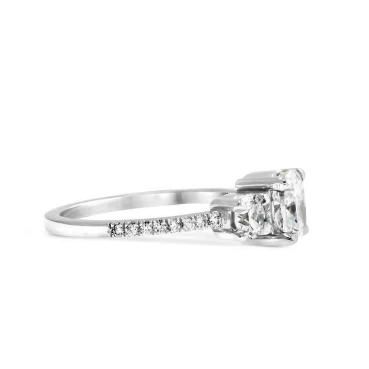 Lab Diamond three stone engagement ring with round lab-grown diamond accents and a pave band. Made in New York City.