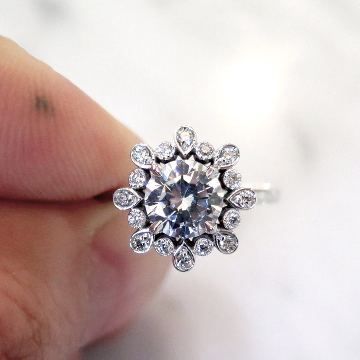 Floral inspired diamond engagement ring with unique details in platinum - Fleurette