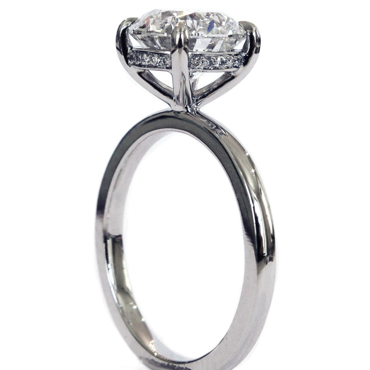 Gracie unique diamond solitaire engagement ring with secret diamonds in platinum - profile