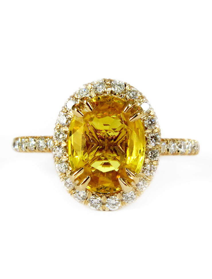 Gia oval yellow sapphire halo engagement ring in yellow gold with delicate diamond band 