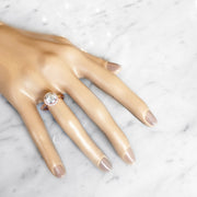 Unique rose gold & diamond halo on hand - Giselle