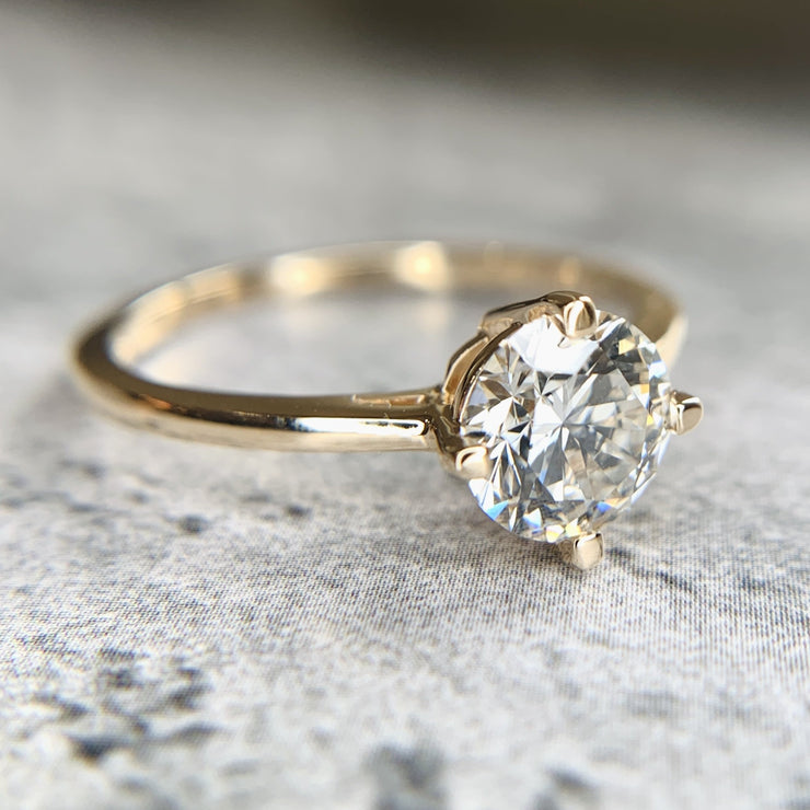 1 carat lab diamond engagement ring set in 14k yellow gold. DANA WALDEN BRIDAL.