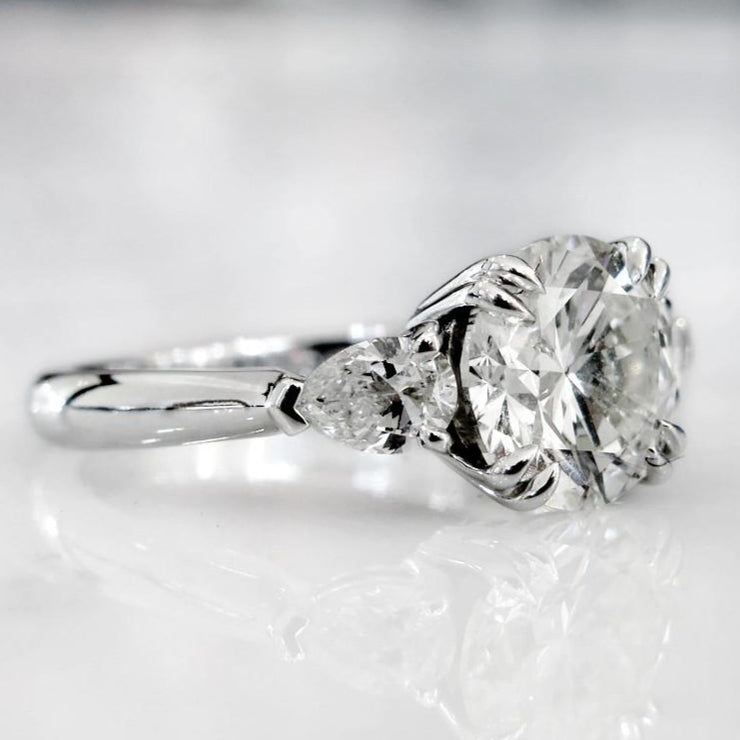 Three stone diamond ring with pear side diamonds in platinum - side profile - Portia