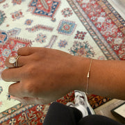 Rad wearing the four diamond bracelet in 14k gold. DANA WALDEN BRIDAL JEWELRY NYC.