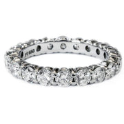 White gold round brilliant diamond eternity band by DANA WALDEN NYC.