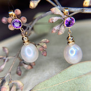 Iyla freshwater pearl drop earrings with amethyst gems. Handmade in the USA by Dana Walden Jewelry.