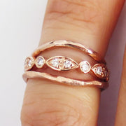 India and Zola rose gold wedding bands by DANA WALDEN. ON FINGER.