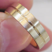 Yellow gold handmade men's wedding ring by DANA WALDEN BRIDAL.