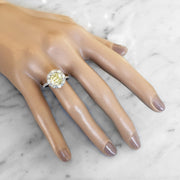 Old mine yellow diamond  with white diamond halo. DANA WALDEN BRIDAL NYC.