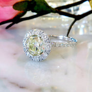 Old mine yellow diamond  with white diamond halo. DANA WALDEN BRIDAL NYC.