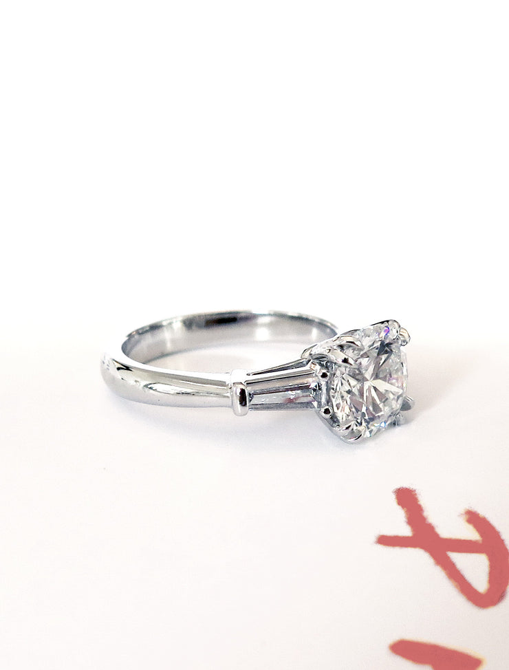 Diamond three stone engagement ring with tapered baguettes in white gold - side profile- Leandra