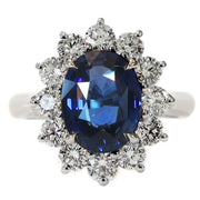 Kate Middleton style engagement ring in blue sapphire and diamond halo - Dana Walden - NYC