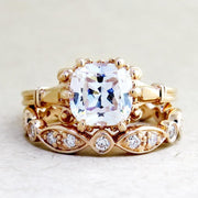 Lulu Edwardian diamond engagement ring with an ornate Dana Walden wedding band.