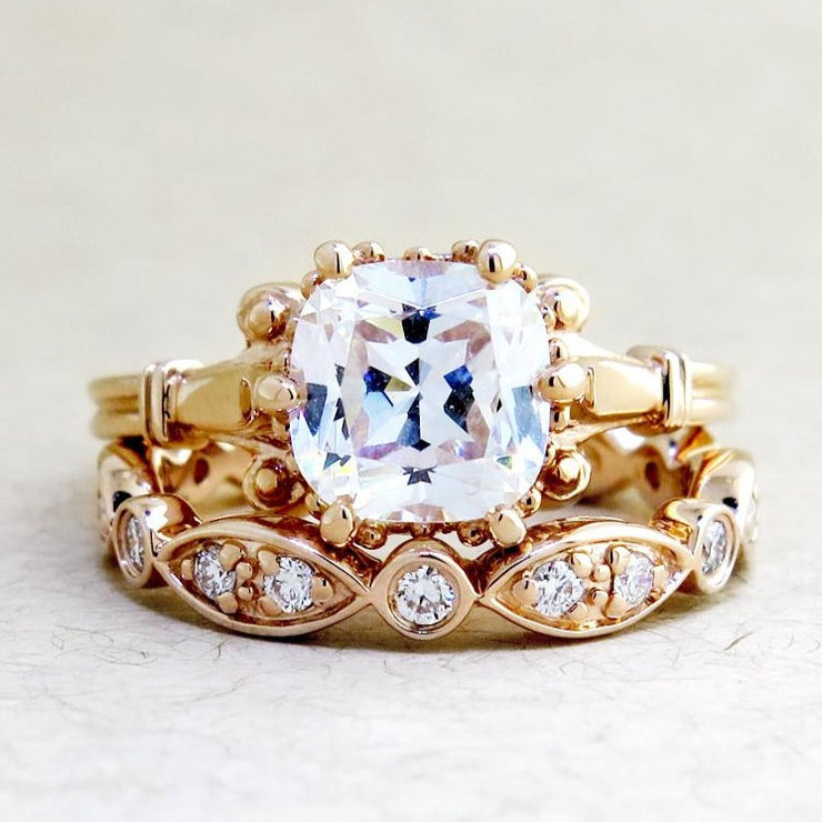 Lulu Edwardian diamond engagement ring with an ornate Dana Walden wedding band.