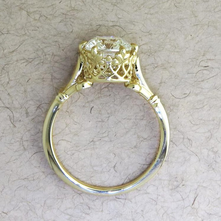 Side view of the ornate and unique gold engagement ring by Dana Walden Bridal.