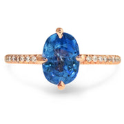 Maeve unique blue sapphire and rose gold engagement ring with conflict free diamond band