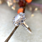 Side view- Ethical diamond halo engagement ring set in yellow gold. Handmade by Dana Walden Bridal Jewelry.