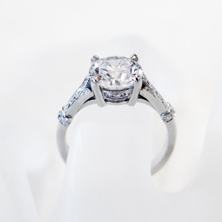 Side view of the Minna white gold diamond solitaire engagement ring. Made in NYC by Dana Walden Bridal.