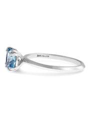 Nontraditional Aquamarine engagement ring with knife edge band in white gold side profile