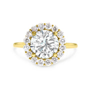 Ethically handmade round diamond halo engagement ring by DANA WALDEN BRIDAL.
