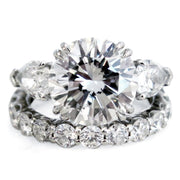 Handmade three stone diamond engagement ring with pear shaped diamond side stones in platinum nyc - Portia