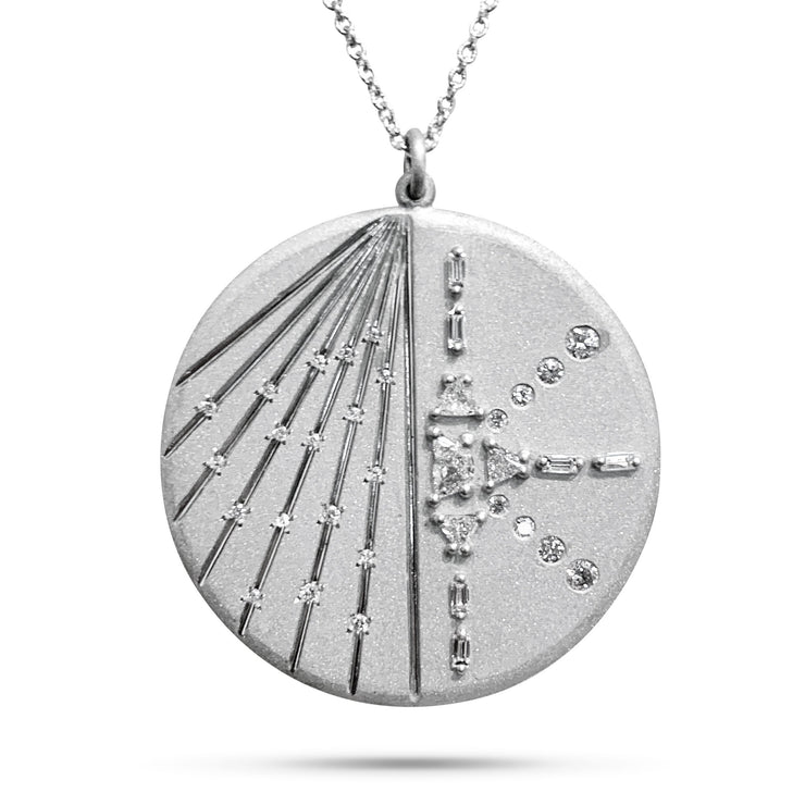 A handmade platinum medallion with conflict-free diamonds and chain. Dana Walden Jewelry NYC.