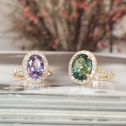 Purple sapphire and green sapphire oval halo engagement ring by DANA WALDEN.