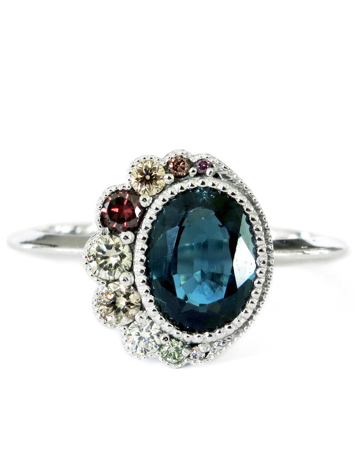 Blue sapphire and fancy diamond cocktail ring by Dana Walden Jewelry.