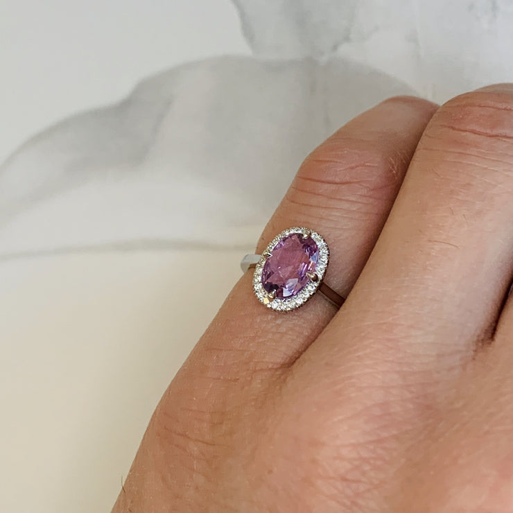 Purple Sapphire Halo Engagement Ring in White Gold - NYC - Shown on finger
