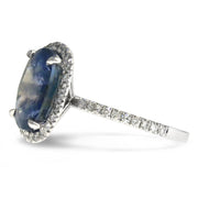 Valora 6 carat blue grey sapphire halo engagement ring in white gold with conflict free diamonds oval cut side profile