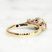 Yellow gold three stone diamond engagement ring by Dana Walden NYC.