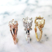 A trio of unique diamond engagement rings in yellow, rose, and white gold by Dana Walden Bridal, NYC 